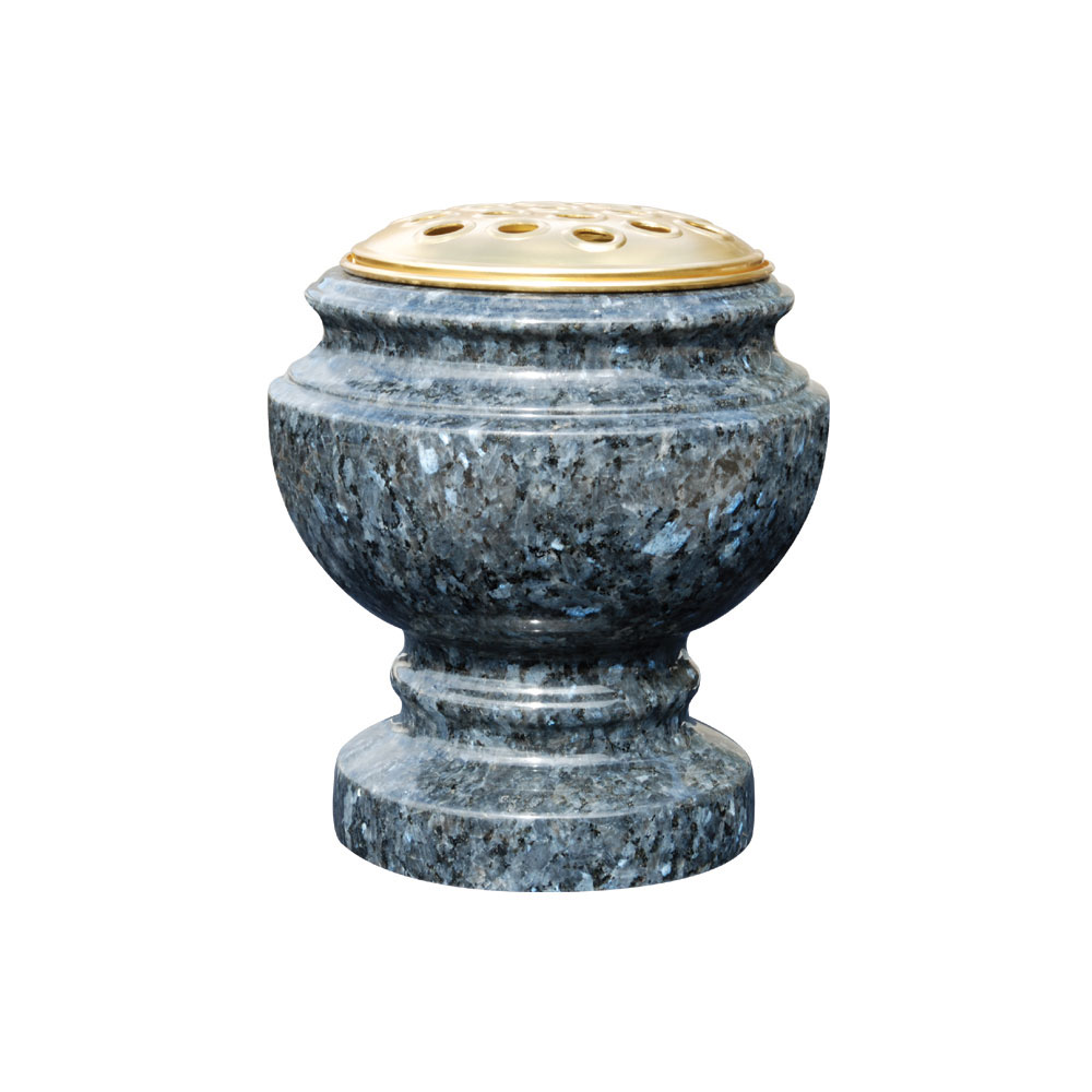 A marble cemetery bowl vase with a gold lid